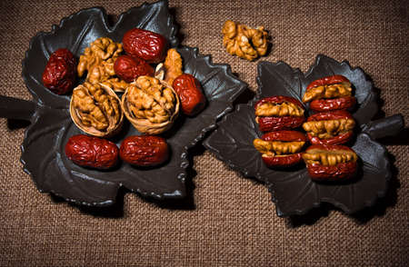 Red dates and walnutsの写真素材