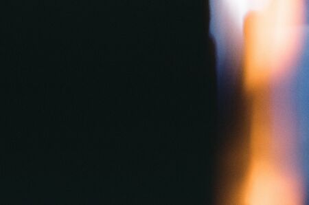 Real macro photo of 35mm dia film frame or strip on white with signs of usage, dust and film grainの写真素材