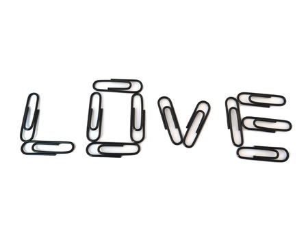 love paper-clip isolated on white backgroundの写真素材