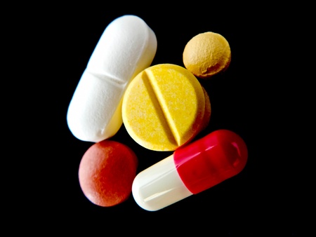 Color medicine isolated on black backgroundの写真素材
