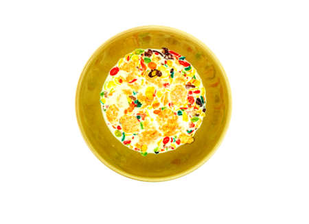 colorful cereals and milk in bowl on white backgroundの写真素材