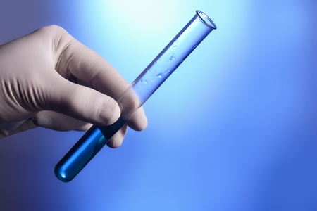 test tube in handの写真素材