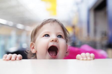 beauty baby open mouth and screamの写真素材