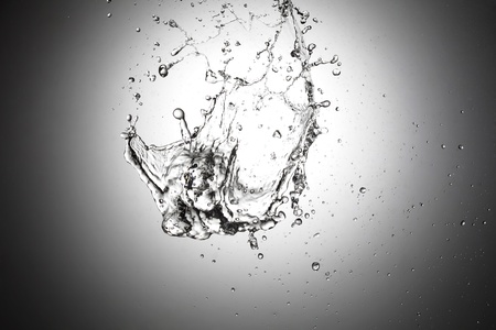 water splash on grey backgroundの写真素材