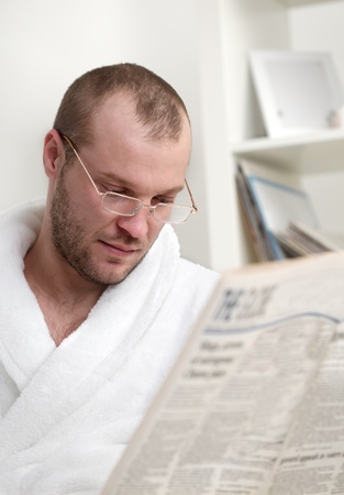  young man with  newspaperの写真素材
