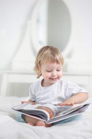 happy boy read bookの写真素材