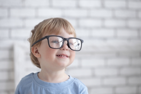cute little kid in glassesの写真素材