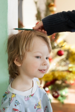 measure the growth of  boyの写真素材