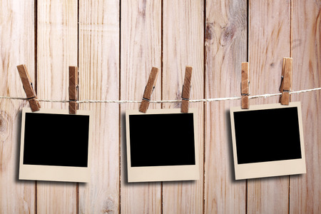 3 old  photo on wood backgroundの写真素材