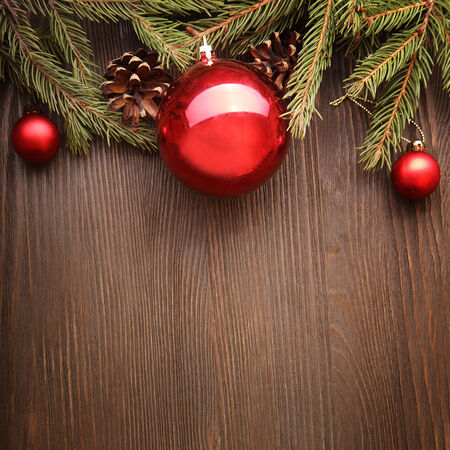 Christmas Tree and decorations on wooden background space for letteringの写真素材