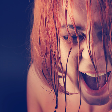 beauty girl cry on black backgroundの写真素材