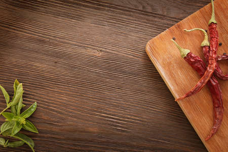 spices and papper in anticipation of cooking on a wooden tableの写真素材