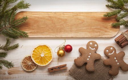gingerbread Christmas tree and gifts on wooden table