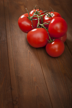 tomato on wood tableの写真素材