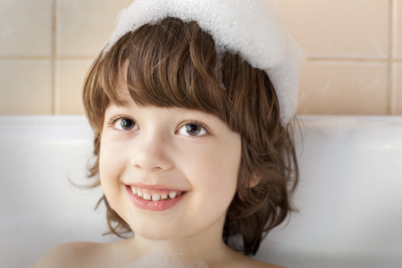 happy boy in bathtubの写真素材