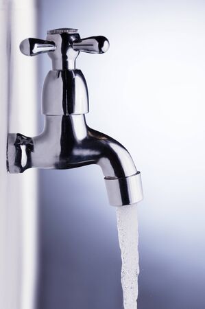 drain water from the tap Metalの写真素材