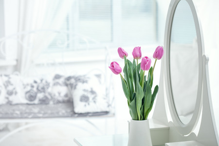 pink tulip in white roomの写真素材