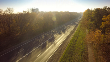Empty road for cars aerial view from top around green nature