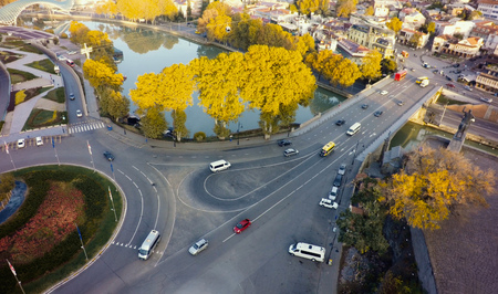 Aerial Top View of highway intersection junction summer morning with car.