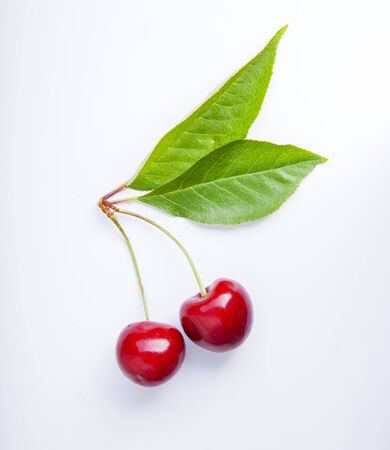Cherry with leaf isolate on white background.の写真素材