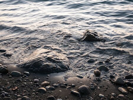 Black sea wave and sky at sunset