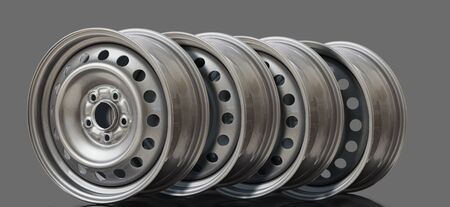 4 Steel wheel rim on grey background