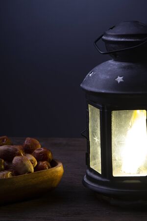 Ramadan Kareem celebration with lanterns and Dried date palm fruits ramazan foodの写真素材