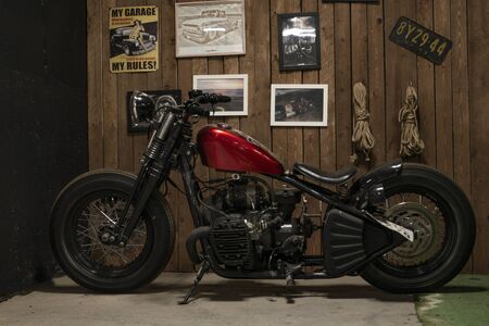 Russia, Saint-Petersburg, 31 May 2018: classic motorcycle chopper in the garageの写真素材