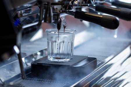 professional coffee machine makes espressoの写真素材