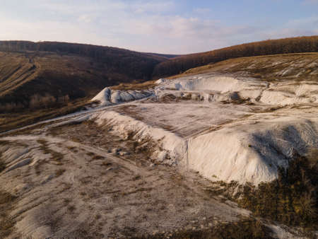 Chalk Mountain surrounded by green hills and forest autumn season