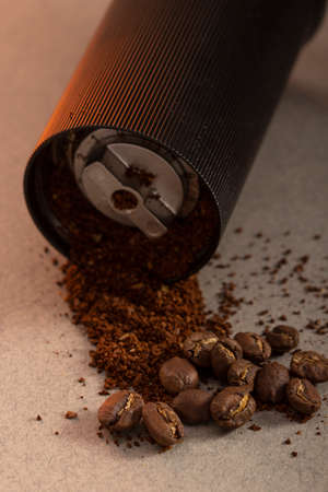 black modern manual coffee grinder and beansの写真素材