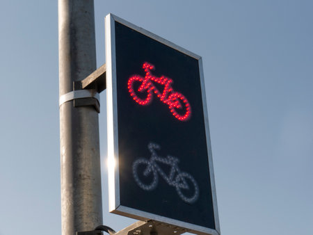 Red Traffic light with a bicycle icon, Bike friendly politics concept.の写真素材