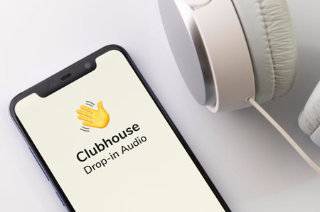 Moscow , Russia - FEB, 08, 2021: Clubhouse drop in audio chat application view on the smartphone. invitation-only audio-chat social networkingのeditorial素材