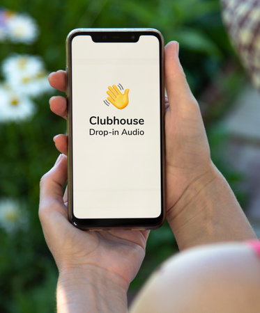 Moscow , Russia - FEB, 08, 2021: Clubhouse drop in audio chat application view on the smartphone. invitation-only audio-chat social networkingのeditorial素材