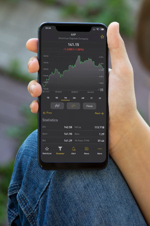 Moscow , Russia - SPT 23, 2020: Graph trading data index investment growth chart on smartphone...