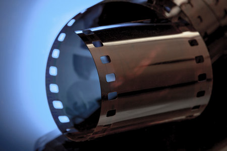 Film reel stripe cinema on blue background