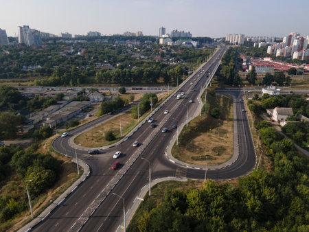 Aerial Top View of highway intersection junction summer morning with car.の写真素材