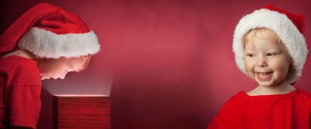happy boy open christmas gift-boxの写真素材