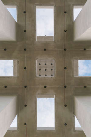 Try looking in different angles with a view to the top of the buildingの写真素材