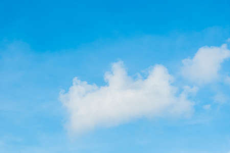 Soft blue sky with white clouds.の写真素材