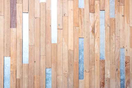 Vintage brown wooden material texture and background with galvanized iron for wall decoration. Abstract old and grunge plank wood surface and pattern wallpaper in loft and retro interior design.の写真素材