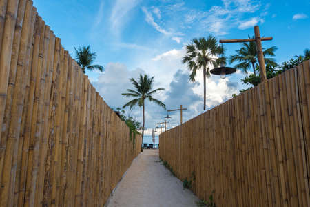 Bamboo fence or wall walkway to the beach,Koh Samui Thailand.