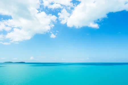 Beautiful summer blue sky and white clouds over calm sea in sunny day.の写真素材