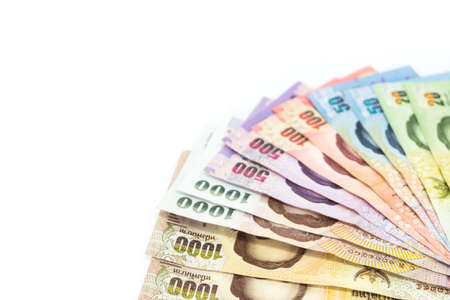 Thai money currency as background, Various of Thai currency banknotes isolated on white background...