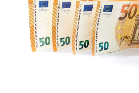 Pile of fifty euro banknotes isolated on white background use for money or currency background and...