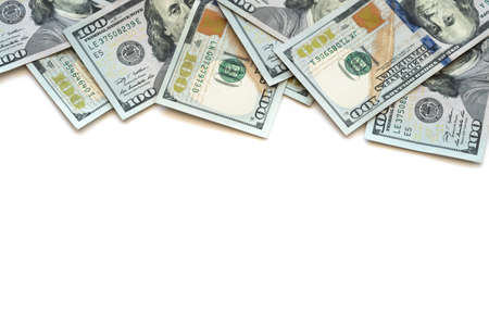 Pile of one hundred US Dollar Bills money isolated on white background with copy space for your text in financial concept.の写真素材