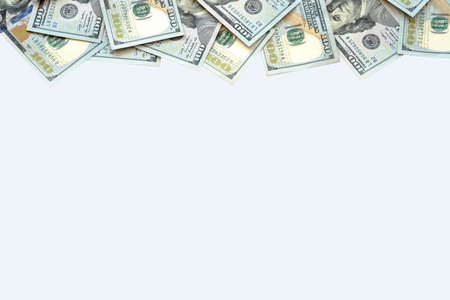 Pile of one hundred US Dollar Bills money isolated on white background with copy space for your text in financial concept.の写真素材