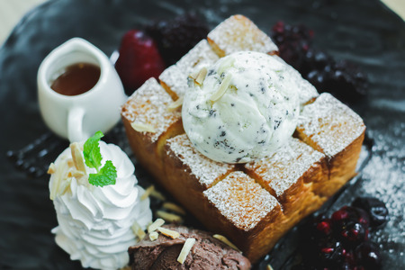 Images near desserts, ice cream, chocolate chips on bread, blurred images