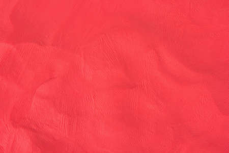 red Plasticine textured background.の写真素材