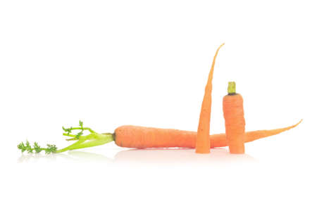 baby carrots isolated on a white background.の写真素材